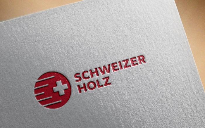 Dokument mit eingeprägtem Label Schweizer Holz